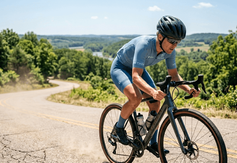 Cyclist training hard during a summer road ride
