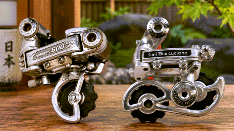 Suntour and Shimano rear derailleurs