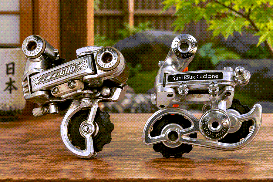Suntour and Shimano rear derailleurs